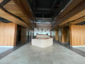 Grand lobby with double-height ceiling and wood paneling — Grade A Office Space, Sector 136 Noida