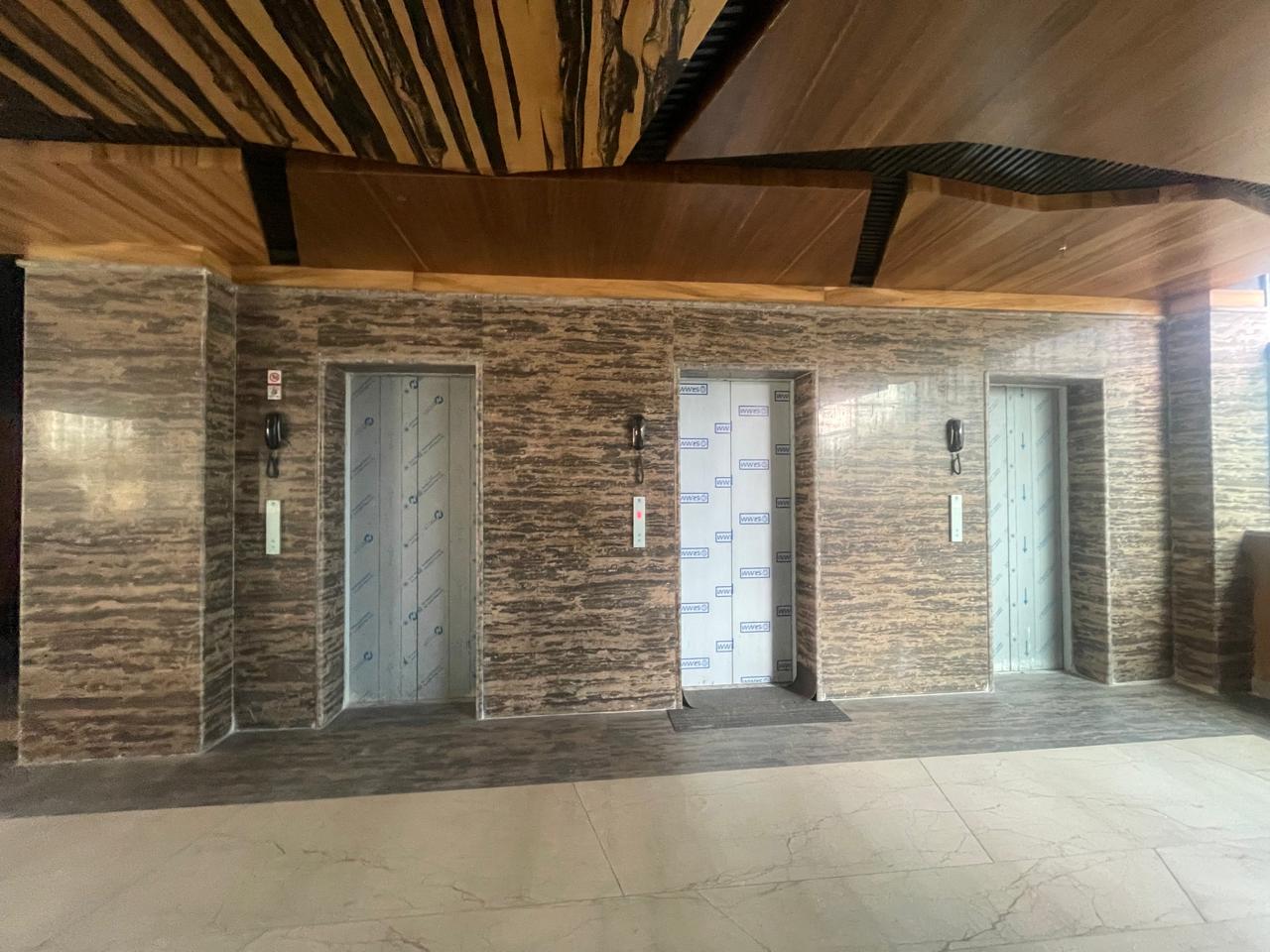 Three high-speed passenger lifts — Grade A Office Building, Sector 136 Noida