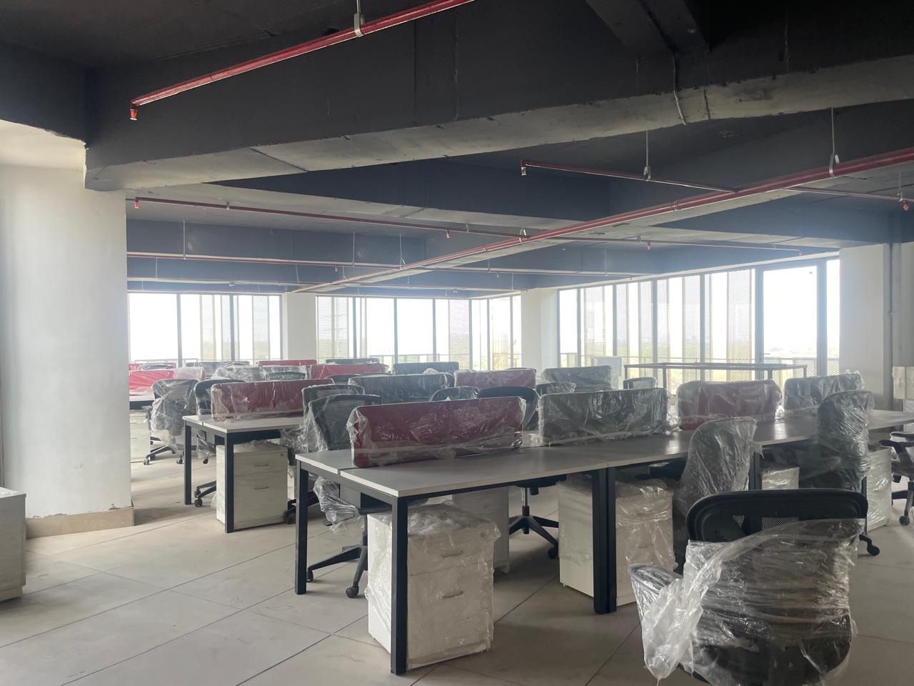 Floor plate with large windows and city views — 63000 sqft office building Sector 136